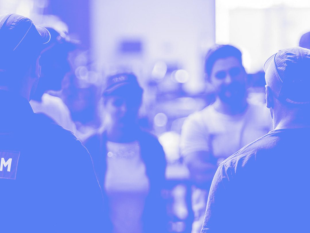 A corporate interview being filmed, tinted blue